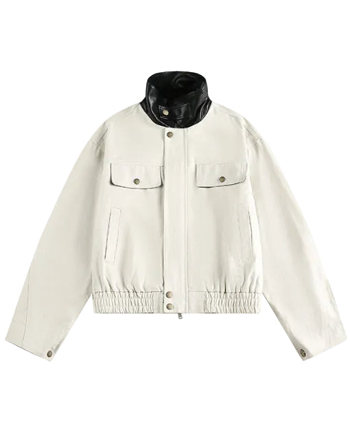 Discover the Teddy Blaze cotton bomber jacket featuring a contrasting black faux-leather stand collar. Available in beige and dark blue colorways, this piece blends structured utility with modern street-luxury styling.