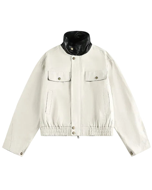 Discover the Teddy Blaze cotton bomber jacket featuring a contrasting black faux-leather stand collar. Available in beige and dark blue colorways, this piece blends structured utility with modern street-luxury styling.