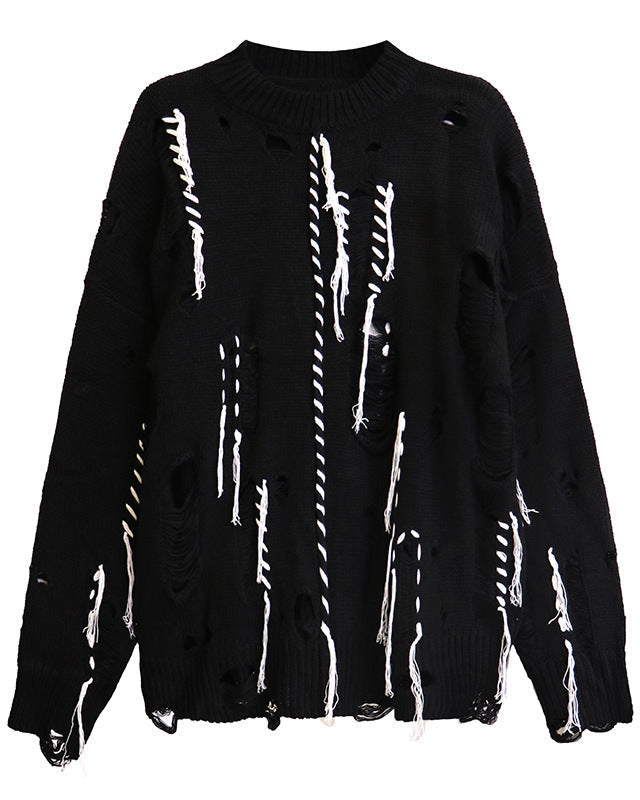 Discover the Teddy Blaze black knitted cotton blend sweater featuring contrasting white colorblock details, intentional distressing, and a relaxed oversized silhouette. A high-impact piece built for street-forward casual styling.