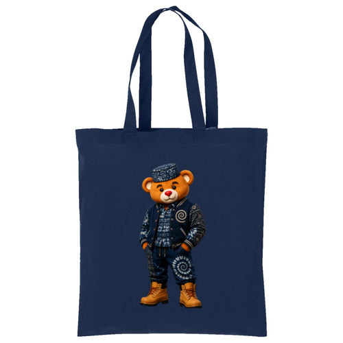 Carry Teddy Blaze Indigo on a navy 100% cotton tote featuring Afrocentric indigo textile style. Lightweight everyday bag printed in Detroit.