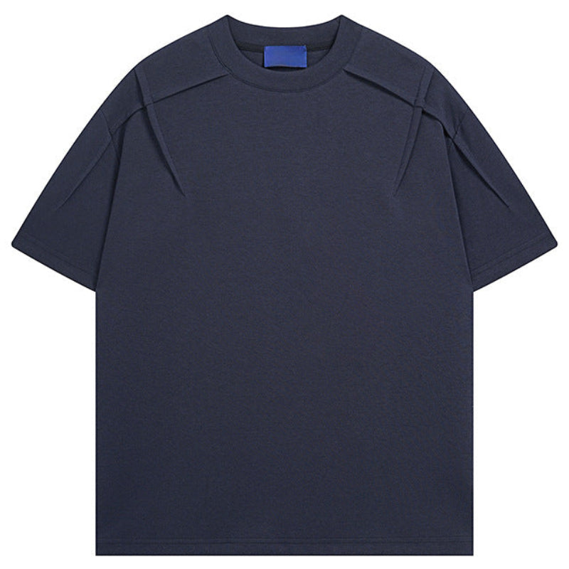 Shop the Architectural Pleat Drop Shoulder Tee by Teddy Blaze. Premium cotton-blend loose-fit t-shirt featuring diagonal chest pleat seams from THE IVY MAN.