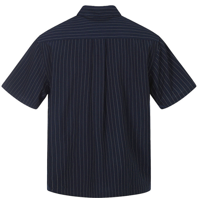 Shop the Iron + Ivy Wrinkle-Resistant Pinstripe Resort Shirt by Teddy Blaze. Crisp off-white short-sleeve button-down shirt featuring fine vertical navy pinstripes.