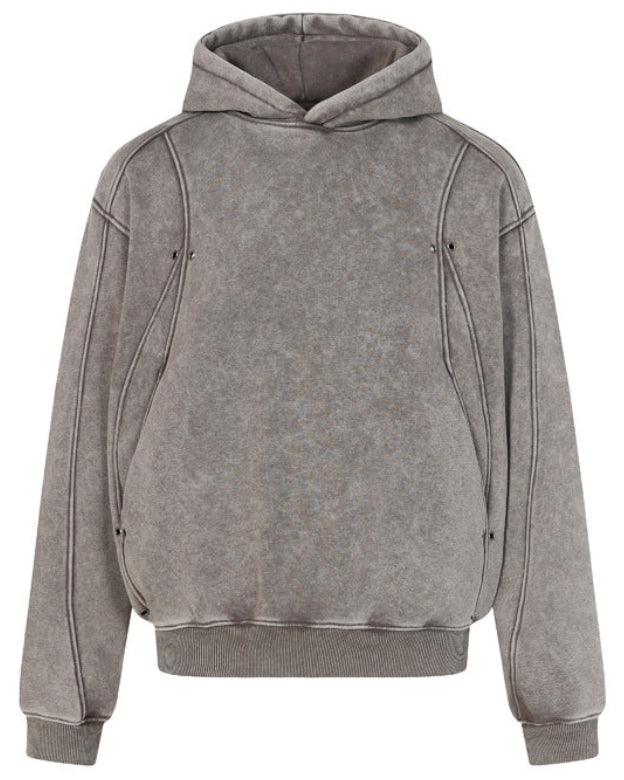 Discover the Teddy Blaze distressed washed patchwork hoodie. Available in black and khaki, featuring a high neck, zipper closure, and relaxed oversized fit.