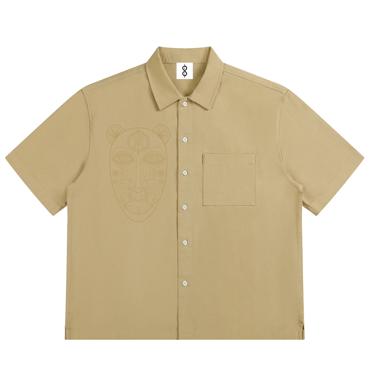 A beige short-sleeve button-up shirt with a subtle tonal skull graphic on the left chest, displayed flat against a solid white background.