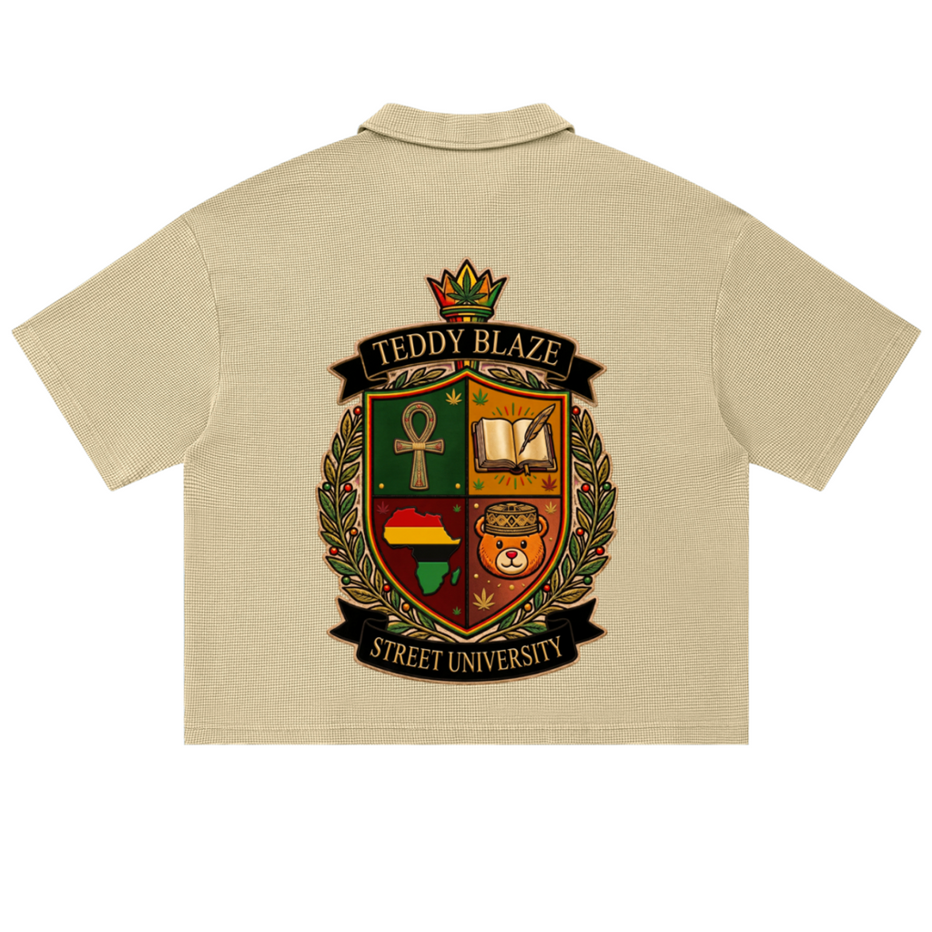 A beige short-sleeve polo shirt shown from the back, featuring a large detailed crest graphic with the text 'TEDDY BLAZE' and 'STREET UNIVERSITY' on a white background.