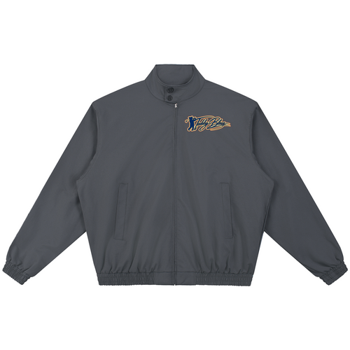 A dark gray zip-up jacket with a stand collar, elastic cuffs, and side pockets, featuring a stylized embroidered logo on the left chest in gold and navy blue, displayed on a solid white background.