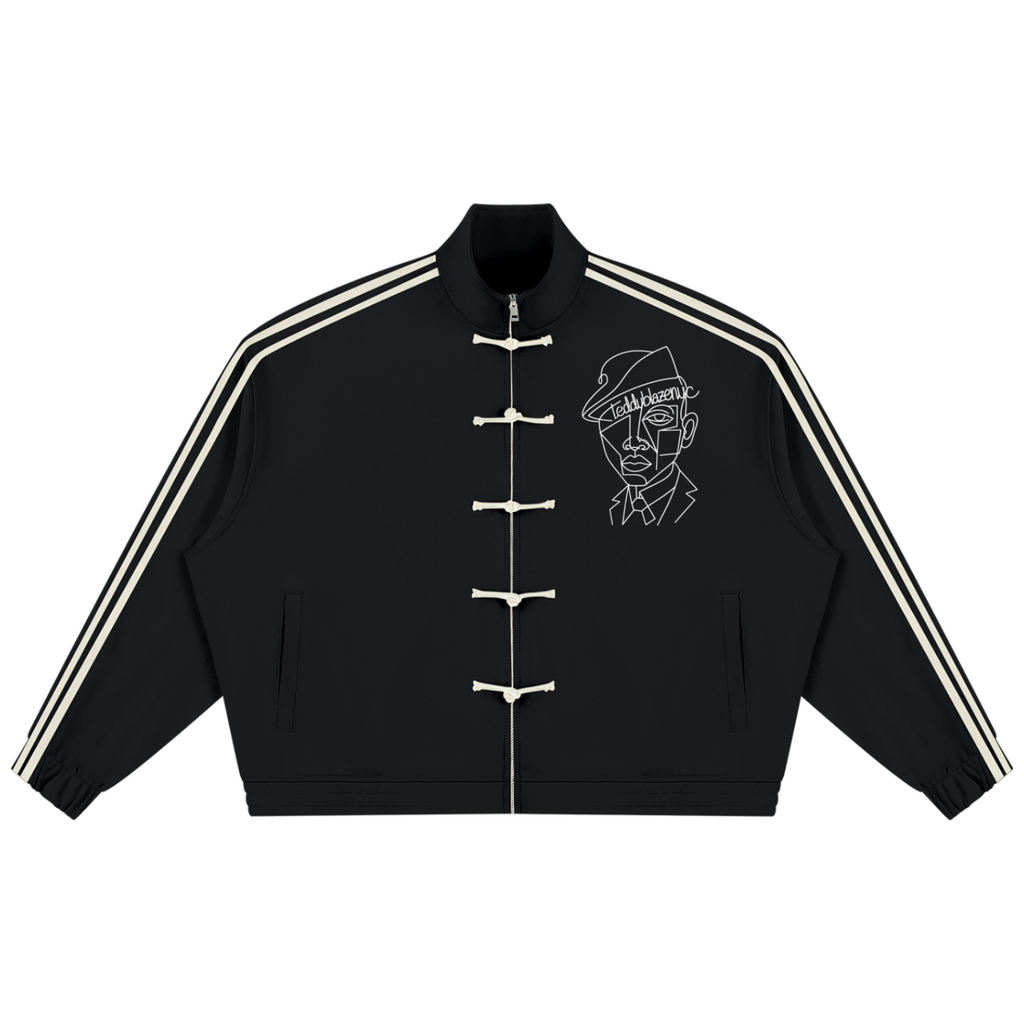 Elevate your outerwear rotation with the House of Teddy Blaze Afro Yorker Striped Sleeve Box Cut Pankou Jacket. Black 350 gsm heavyweight jacket, Pankou knot buttons, athletic sleeve stripes, Afro Yorker chest embroidery, and NYC Statue of Liberty back emblem. Shop NYC to Vegas style.