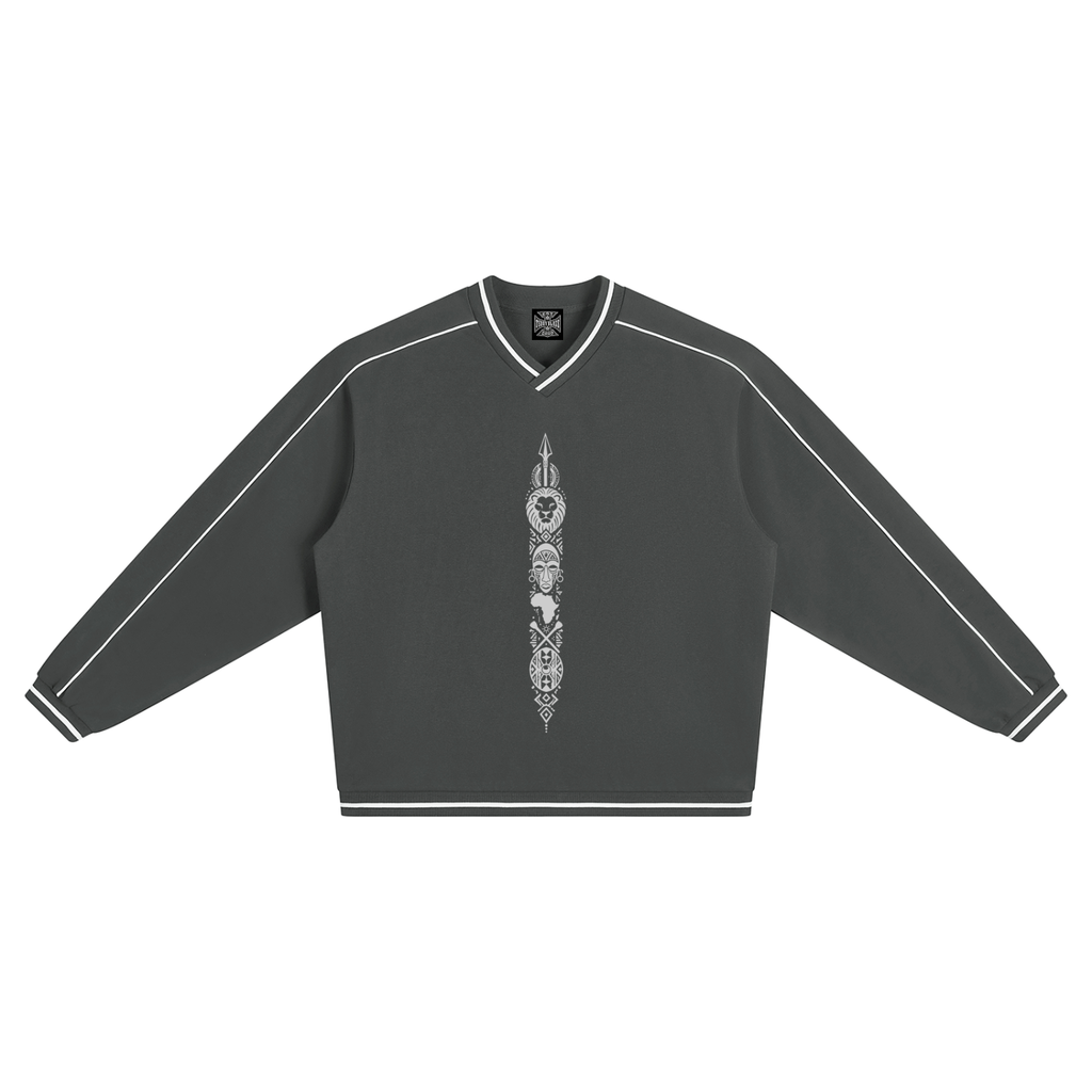 A charcoal collegiate V-neck jumper with contrast piping, striped trim and Teddy Blaze Afrodemia Americana artwork. Premium Afrocentric everyday sportswear.