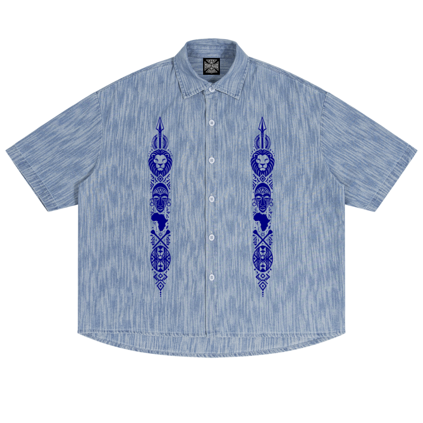 Discover the Teddy Blaze Afrodemia Boxy Vintage Wash Denim Camp Shirt, featuring Afrocentric graphics, a relaxed unisex fit and Afrodemia Americana detailing.