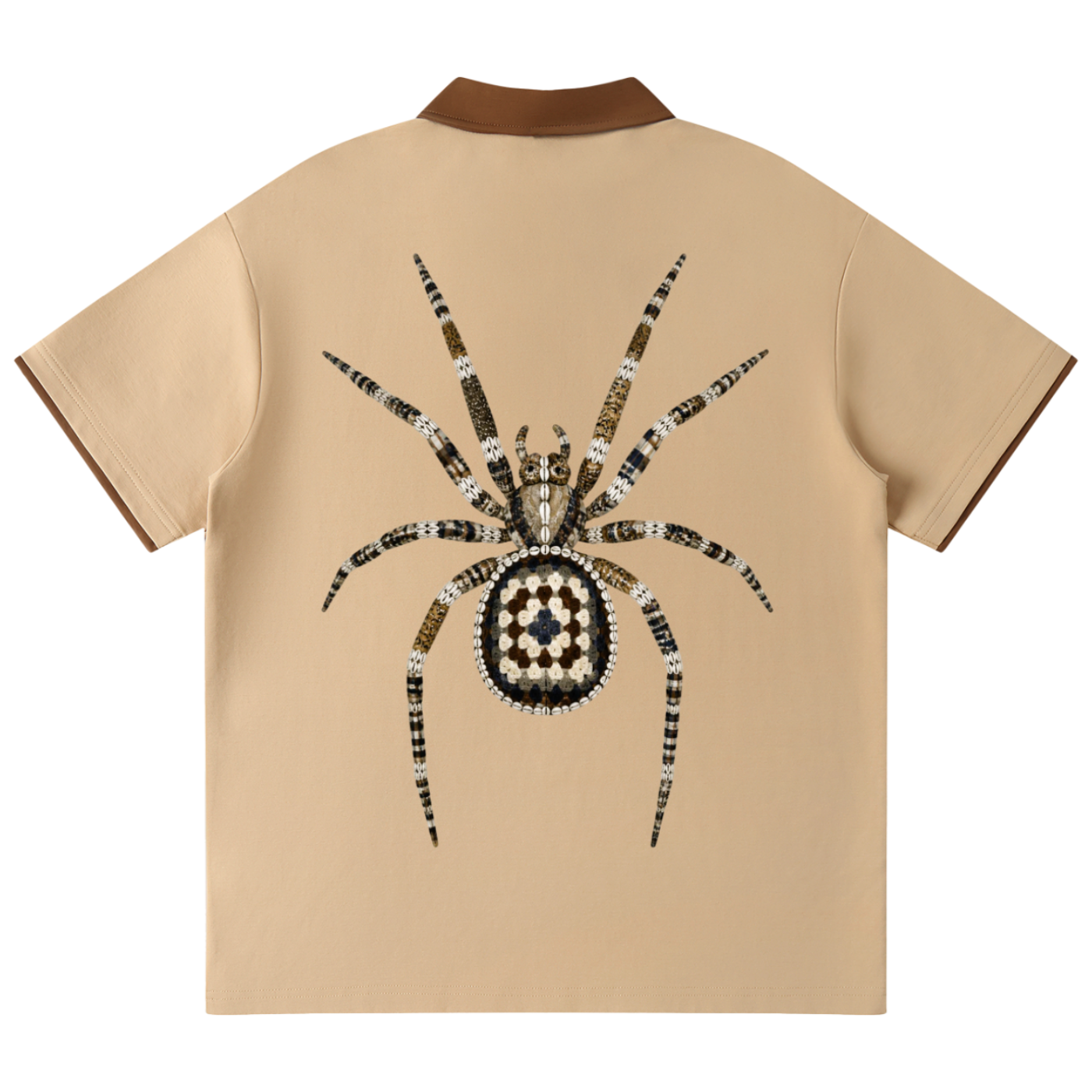 A beige short-sleeve shirt shown from the back, featuring a large spider graphic across the center. The spider is detailed with black, white, and brown patterns, and the shirt has a contrasting brown collar and sleeve trim, set against a plain white background.