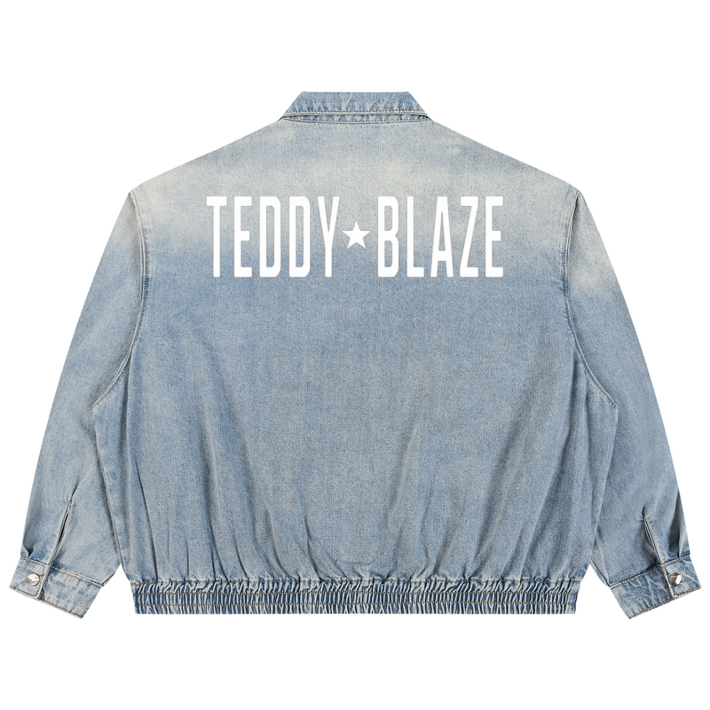 Elevate your casual outerwear with the House of Teddy Blaze Statement Vintage Wash Denim Jacket. Light wash 320 gsm cotton denim, zip front, elastic hem, and bold star block typography. Shop NYC to Vegas style.