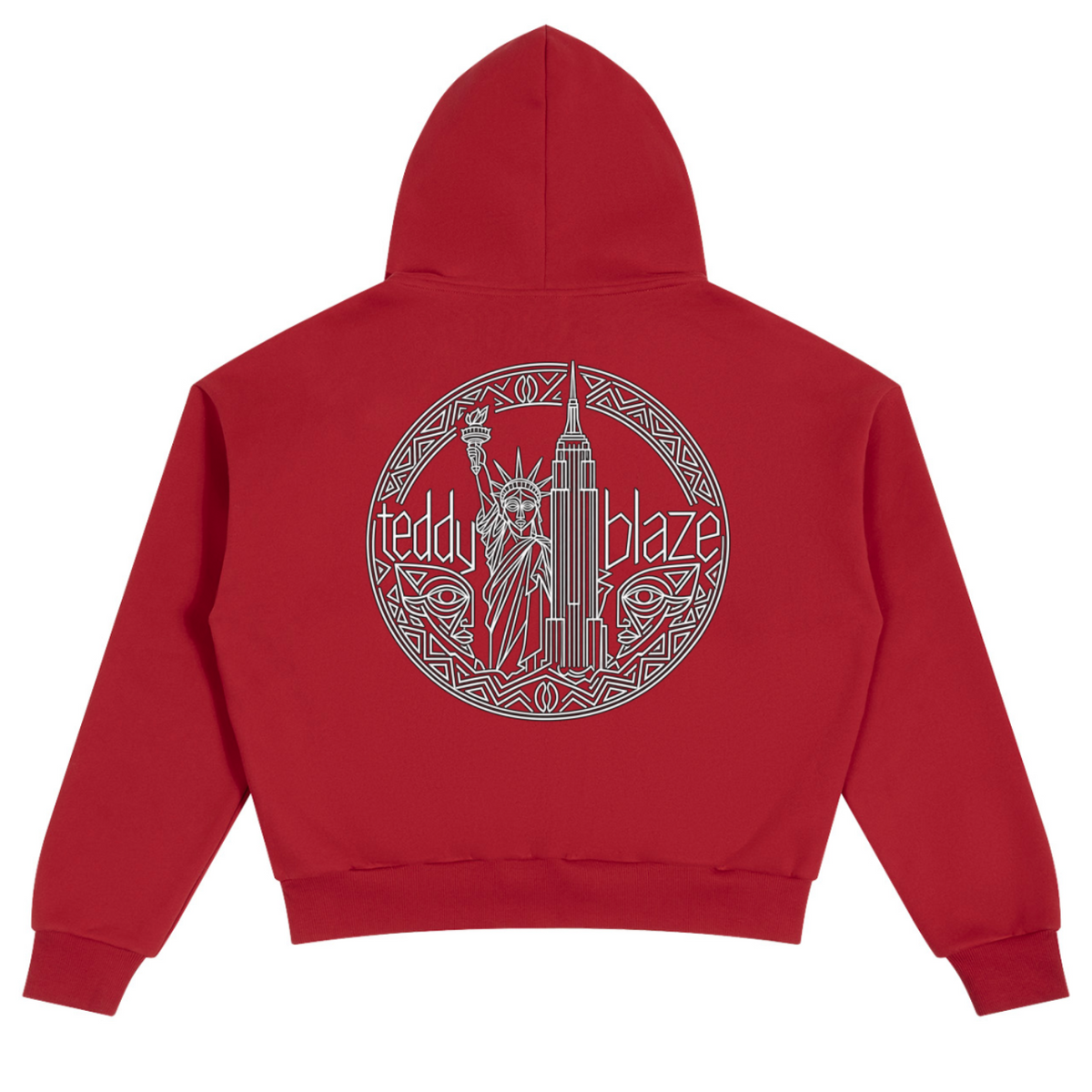 A red cropped hoodie shown from the back, featuring a large circular graphic print in gray with the Statue of Liberty, the Empire State Building, and the text 'teddy blaze'.
