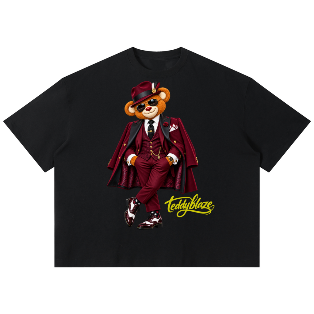 Shop the Bearfather of Vegas Boxy Tee by Teddy Blaze. 220 GSM cotton-poly oversized drop-shoulder t-shirt with suited bear graphic from TOPS BY TEDDY BLAZE.