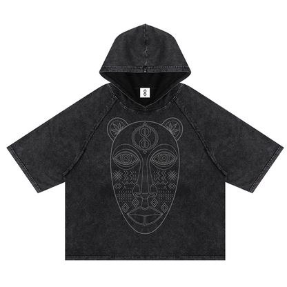 A dark gray acid-wash short-sleeve hoodie with a tonal light gray line-art graphic of an African tribal mask on the front, displayed against a solid white background.