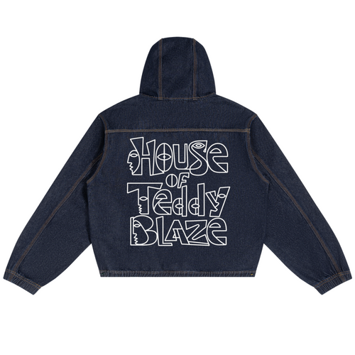 A dark navy blue cropped denim hoodie shown from the back, featuring a large white graphic text print that reads 'House of Teddy Blaze' across the back.