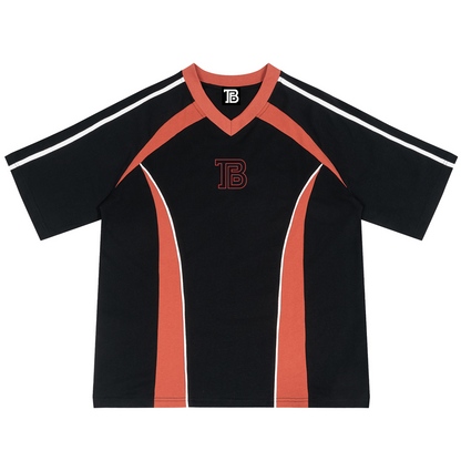 Black sports jersey with red accents and a logo on a white background