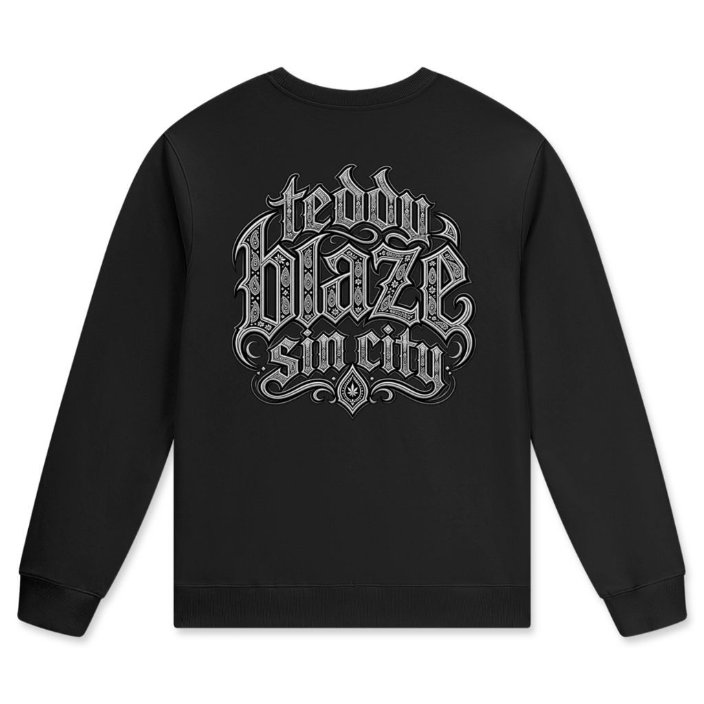 Elevate your cool-weather layers with the Teddy Blaze Sin City Sacred Cotton Jumper. Black cotton crewneck sweatshirt with tattoo praying hands and Sin City back print. Shop NYC to Vegas style.