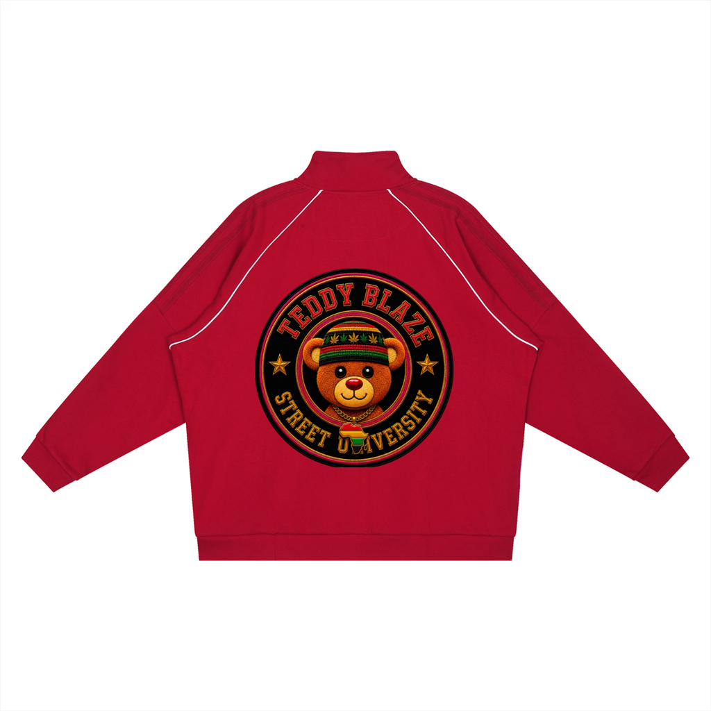 A red zip-up jacket shown from the back, featuring a large circular graphic of a teddy bear wearing a graduation cap with the text 'TEDDY BLAZE' and 'STREET UNIVERSITY'.