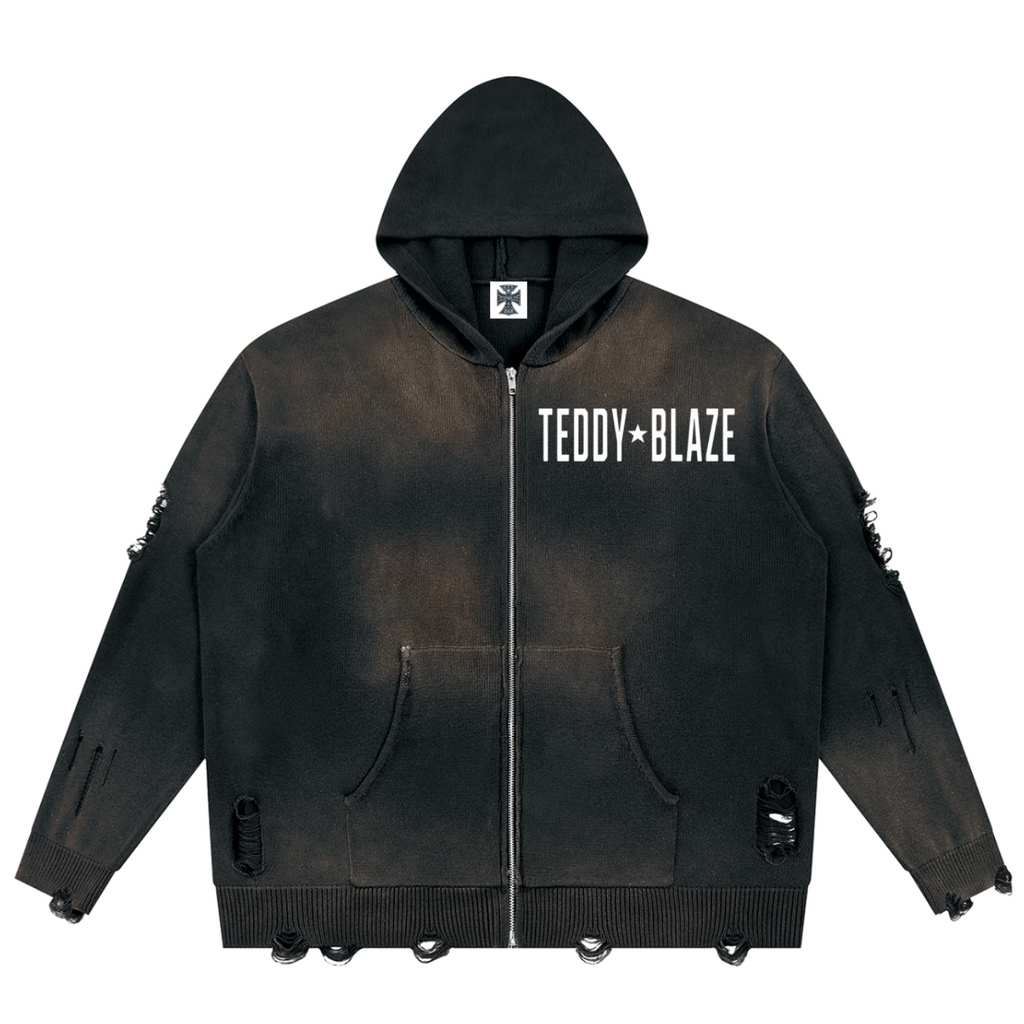 Elevate your distressed outerwear with the House of Teddy Blaze Collateral Damage Zip Hoodie. Vintage black 760 gsm pure cotton, sun-faded wash, distressed ripped details, zip front, and gothic "No More Wars" back graphic. Shop NYC to Vegas style.