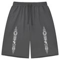 Heavyweight loose-fit charcoal shorts featuring Teddy Blaze Afrodemia Americana artwork, DaCruz detailing, drawstring waist and raw-edge streetwear styling.