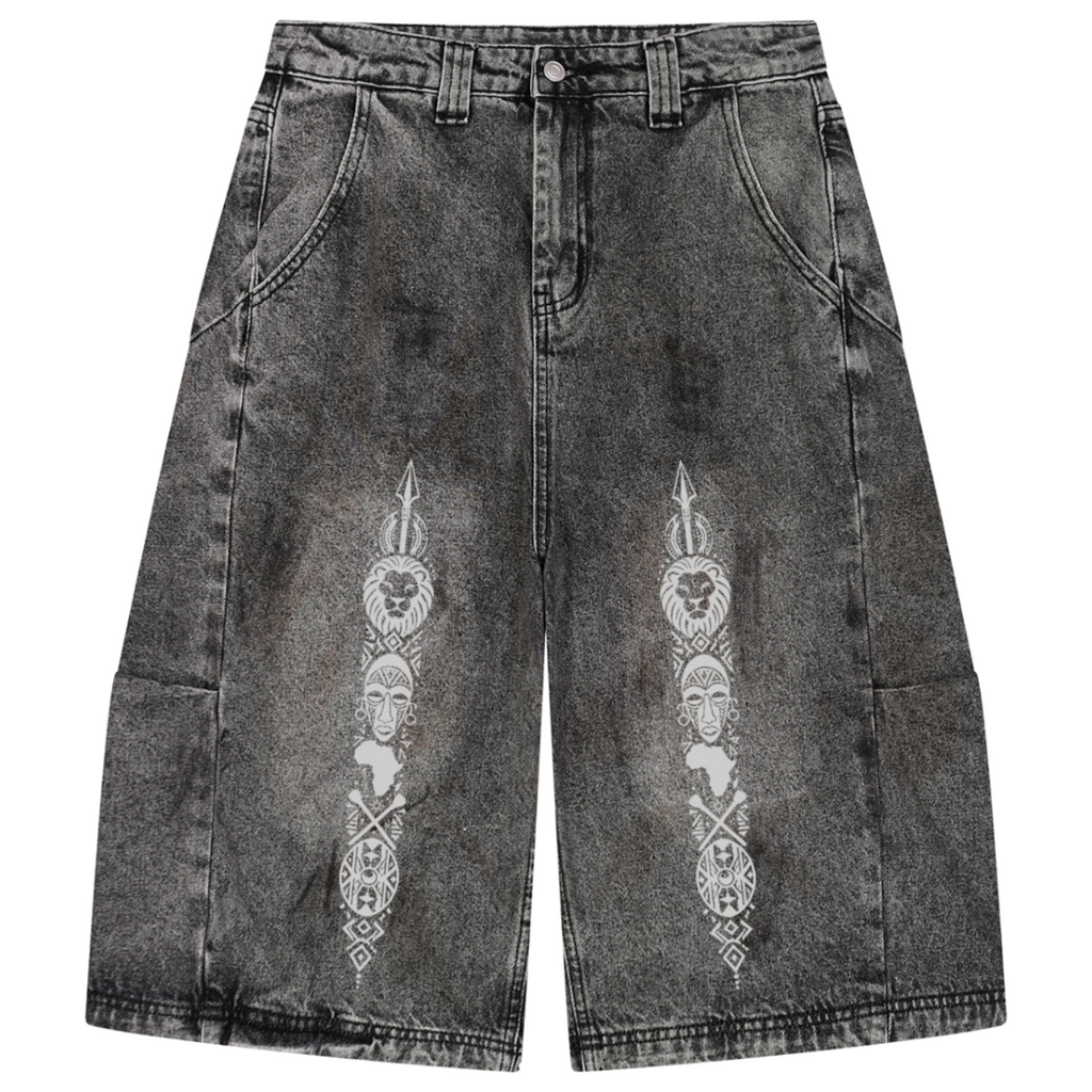 Heavyweight vintage-wash denim jorts from Teddy Blaze featuring a relaxed long silhouette, Afrodemia iconography and signature DaCruz detailing