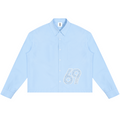 A light blue long-sleeve button-up shirt with a white distressed graphic of the number '69' on the lower right front, displayed flat against a solid white background.