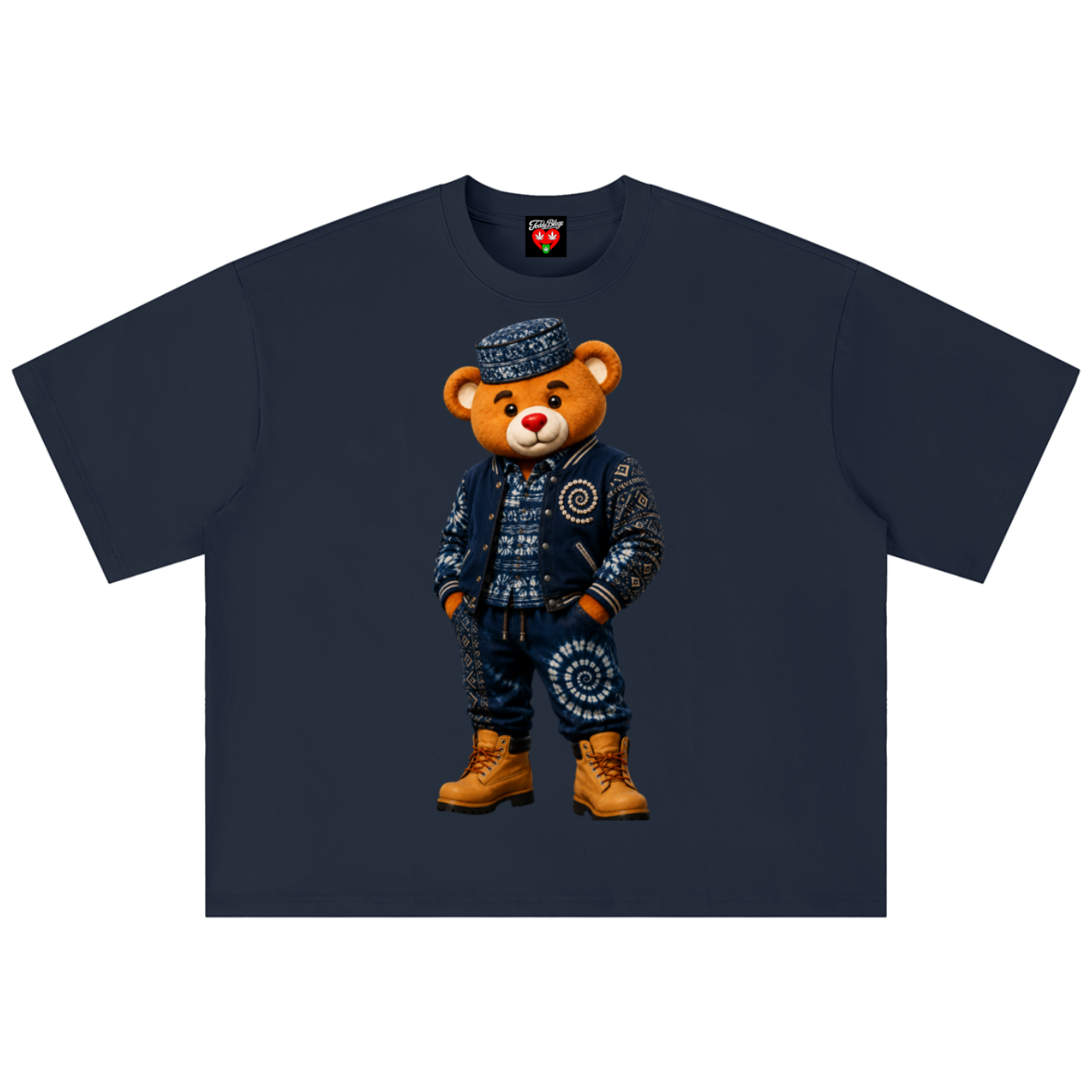 A navy blue short-sleeve t-shirt featuring a graphic of a teddy bear wearing a detailed blue and white patterned outfit with brown boots, displayed flat against a white background.