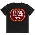 A black short-sleeve crewneck t-shirt featuring a large graphic on the chest. The graphic displays a red rounded rectangle with a border of yellow cannabis leaves, containing the text 'TEDDY BLAZE BRAND NYC' in white.