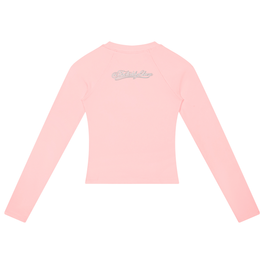 Shop the Signature Cachet Slim Raglan Jumper by Teddy Blaze. Blossom pink stretch-cotton long sleeve cropped top featuring an ornate Ankh emblem from THE BLAZE WOMAN.