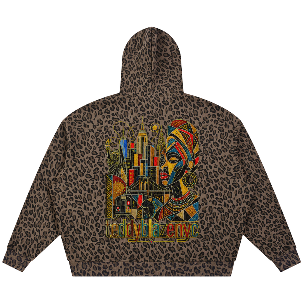 Elevate your hoodie game with the House of Teddy Blaze Afro Yorker Box Cut Leopard Print Hoodie. All-over leopard fleece 320 gsm hoodie, oversized box cut, kangaroo pocket, and Afrocentric NYC skyline back artwork. Shop NYC to Vegas style.