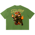 A green short-sleeve t-shirt featuring a graphic of two cartoon bears dressed in samurai armor with flames, and the text 'Teddy Blaze' in gold script above them, shown on a plain white background.