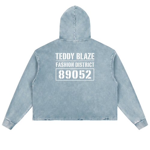 Shop the Signature Vintage Washed Fleece Hooded Jumper by Teddy Blaze. 340 GSM washed slate blue fleece boxy hoodie reflecting stealth wealth and quiet luxury from the COVERUPS line of The Mature Mocha Collection.