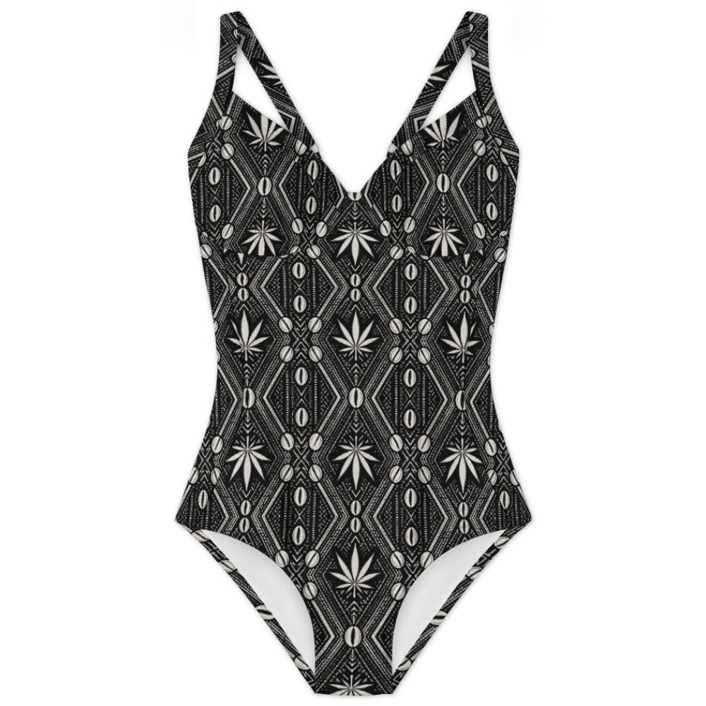 Shop the DaChek monokini with a plunging neckline, adjustable lace-up back and stretchy black-and-white Teddy Blaze swimwear fabric.