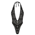 Shop the DaChek Deep-V Thongkini with a plunging neckline, halter ties, high-cut legs and a bold black-and-white Teddy Blaze pattern.