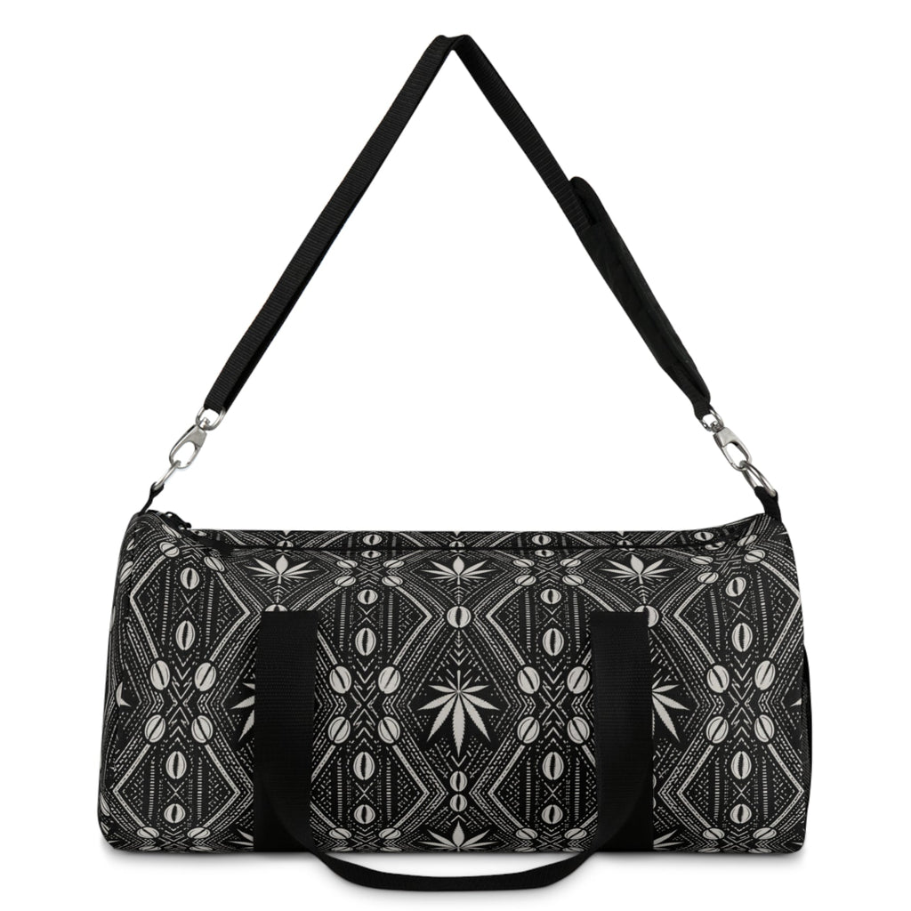 Meet the DaChek™ Getaway, a Teddy Blaze travel duffel featuring monochrome African-inspired patternwork, Oxford canvas, organized storage and an adjustable padded strap.