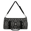 Meet the DaChek™ Getaway, a Teddy Blaze travel duffel featuring monochrome African-inspired patternwork, Oxford canvas, organized storage and an adjustable padded strap.
