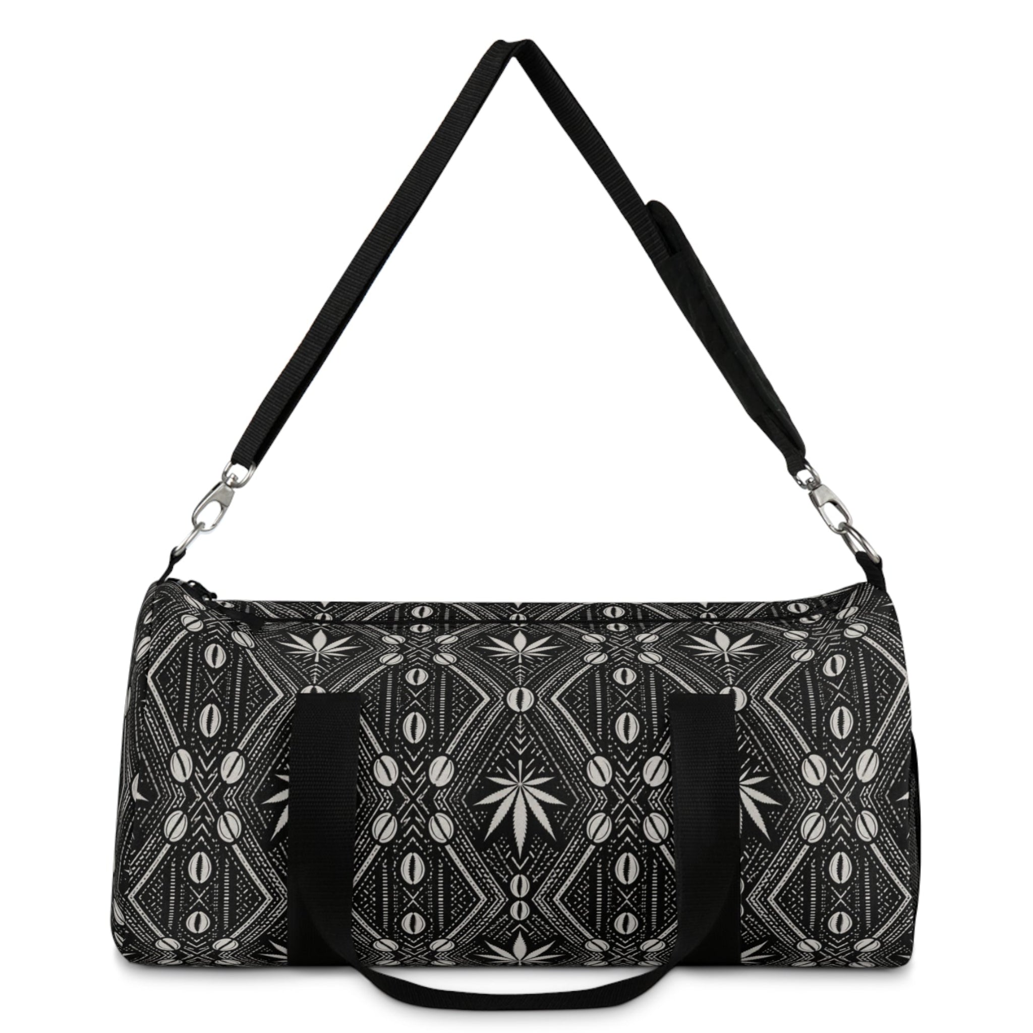 Meet the DaChek™ Getaway, a Teddy Blaze travel duffel featuring monochrome African-inspired patternwork, Oxford canvas, organized storage and an adjustable padded strap.