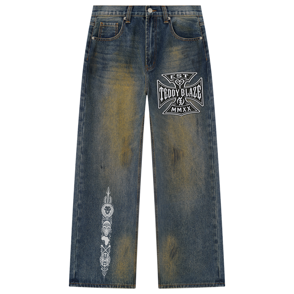 Shop DaCruz Afrodemia Vintage Wash Wide Leg Denim Jeans by Teddy Blaze, featuring heavyweight vintage-wash denim, DaCruz graphics and Afrocentric iconography.