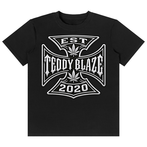 Shop the DaCruz Classic Tee by Teddy Blaze. 180 GSM cotton-spandex stretch tee featuring a silver gothic cross graphic from the TOPS line of The Mature Mocha Collection.