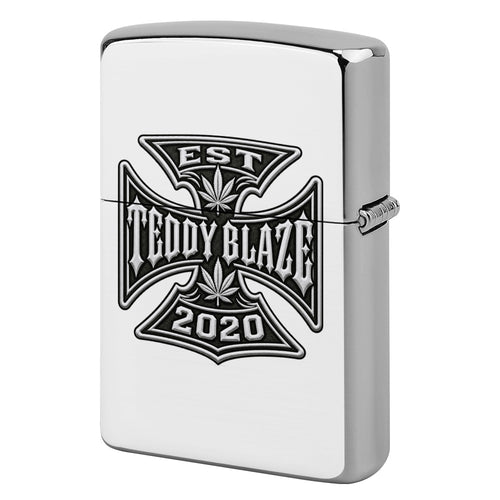 Carry the polished DaCruz Copper Lighter Case, featuring a compact silhouette and bold black-and-white Teddy Blaze house emblem.