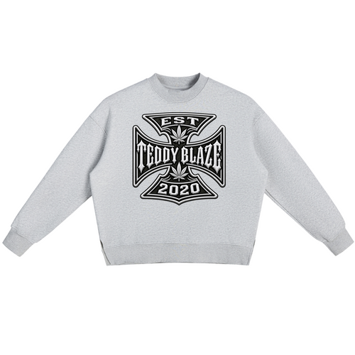 Shop the DaCruz Fleece Side Slit Jumper by Teddy Blaze. 350 GSM heavy fleece heather grey oversized jumper with side slits and Maltese cross graphic from ON TOP.
