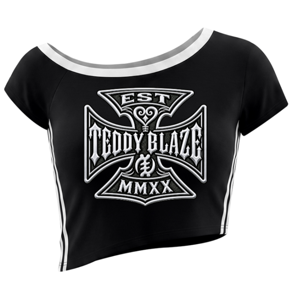 Women’s off-the-shoulder DaCruz crop tee in rayon stretch with striped trim, angled hem, and the new Teddy Blaze crest.