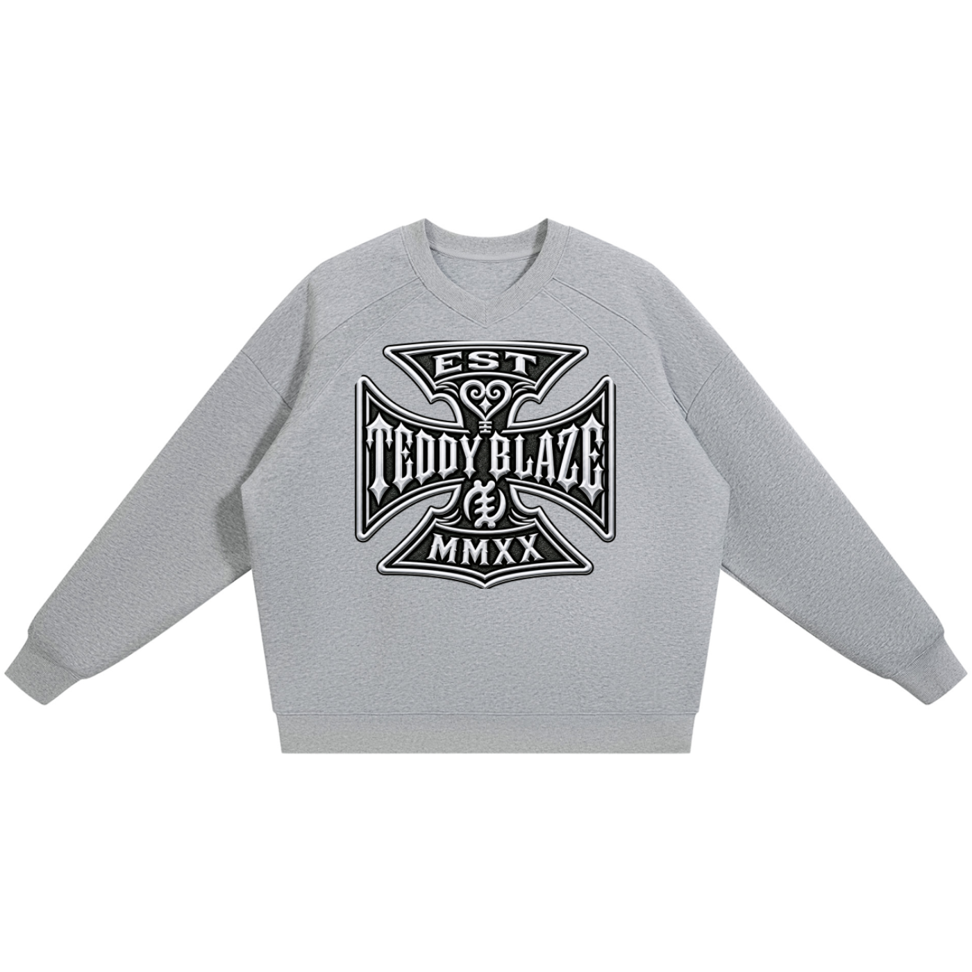 Thick unisex oversized V-neck jumper in heather gray with a bold DaCruz crest. A heavyweight Teddy Blaze layer with relaxed athletic shape.