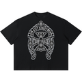 Shop the DaCruz Shoe Boxy Tee by Teddy Blaze. 220 GSM cotton-poly oversized drop-shoulder t-shirt with silver horseshoe filigree graphic from TOPS BY TEDDY BLAZE.