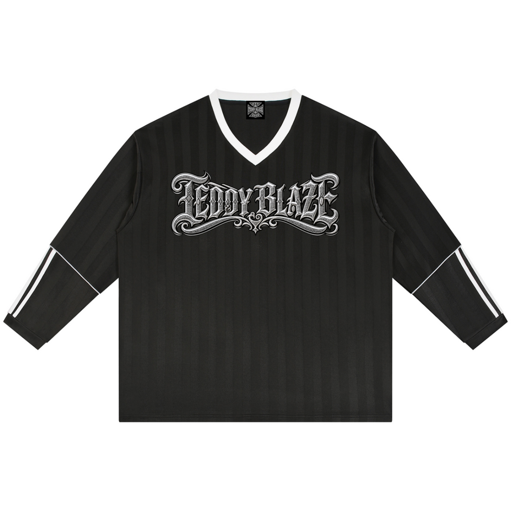 Unisex black striped soccer jersey with a Teddy Blaze Signature front graphic and an oversized DaCruz crest across the back.