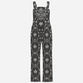 Full-length Teddy Blaze overalls in lightweight polyester, featuring the DaCruz crest bib and all-over black-and-white DaChek™ pattern.