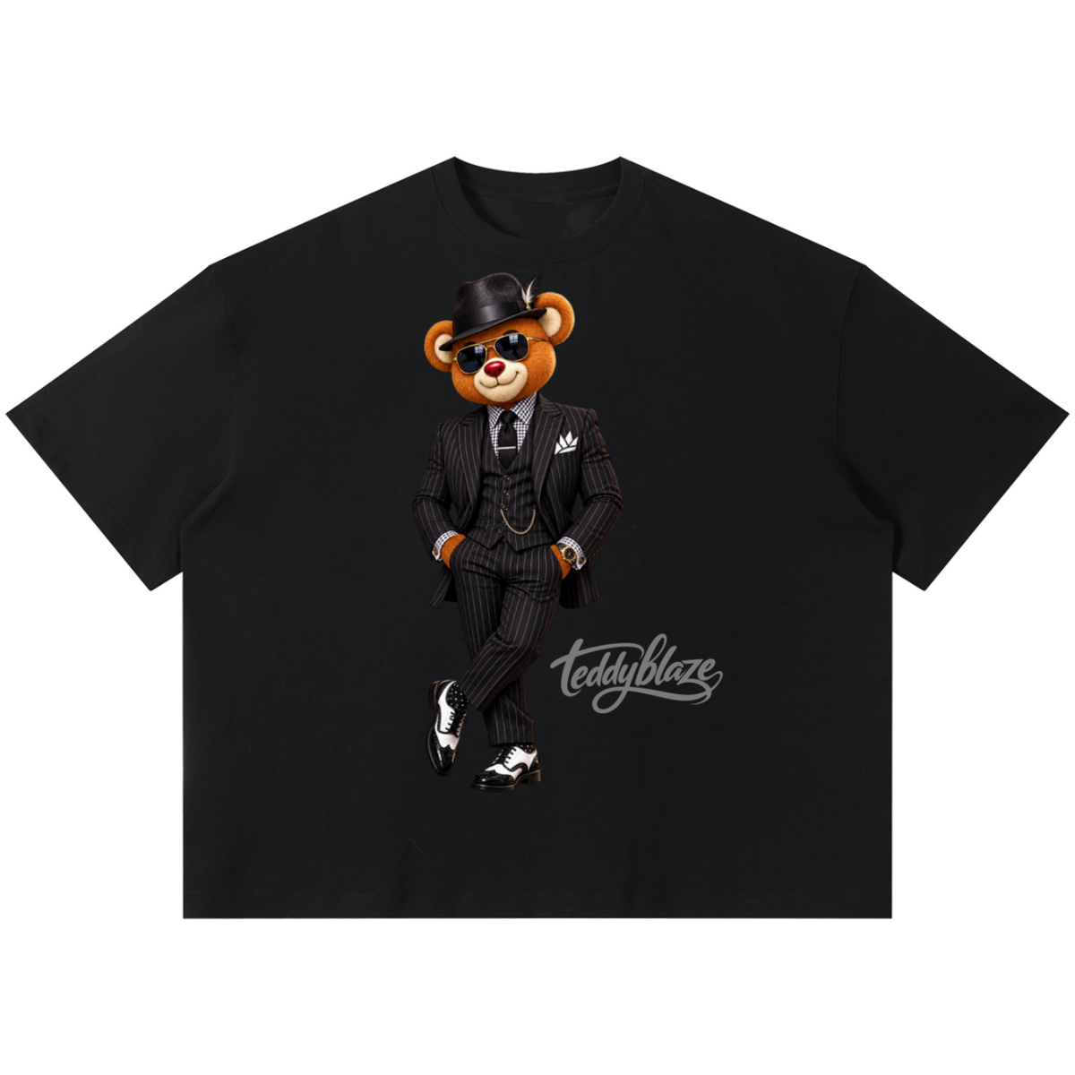 Shop the Dapper Blaze Boxy Tee by Teddy Blaze. 220 GSM cotton-poly oversized drop-shoulder t-shirt with pinstripe-suited bear graphic from TOPS BY TEDDY BLAZE.