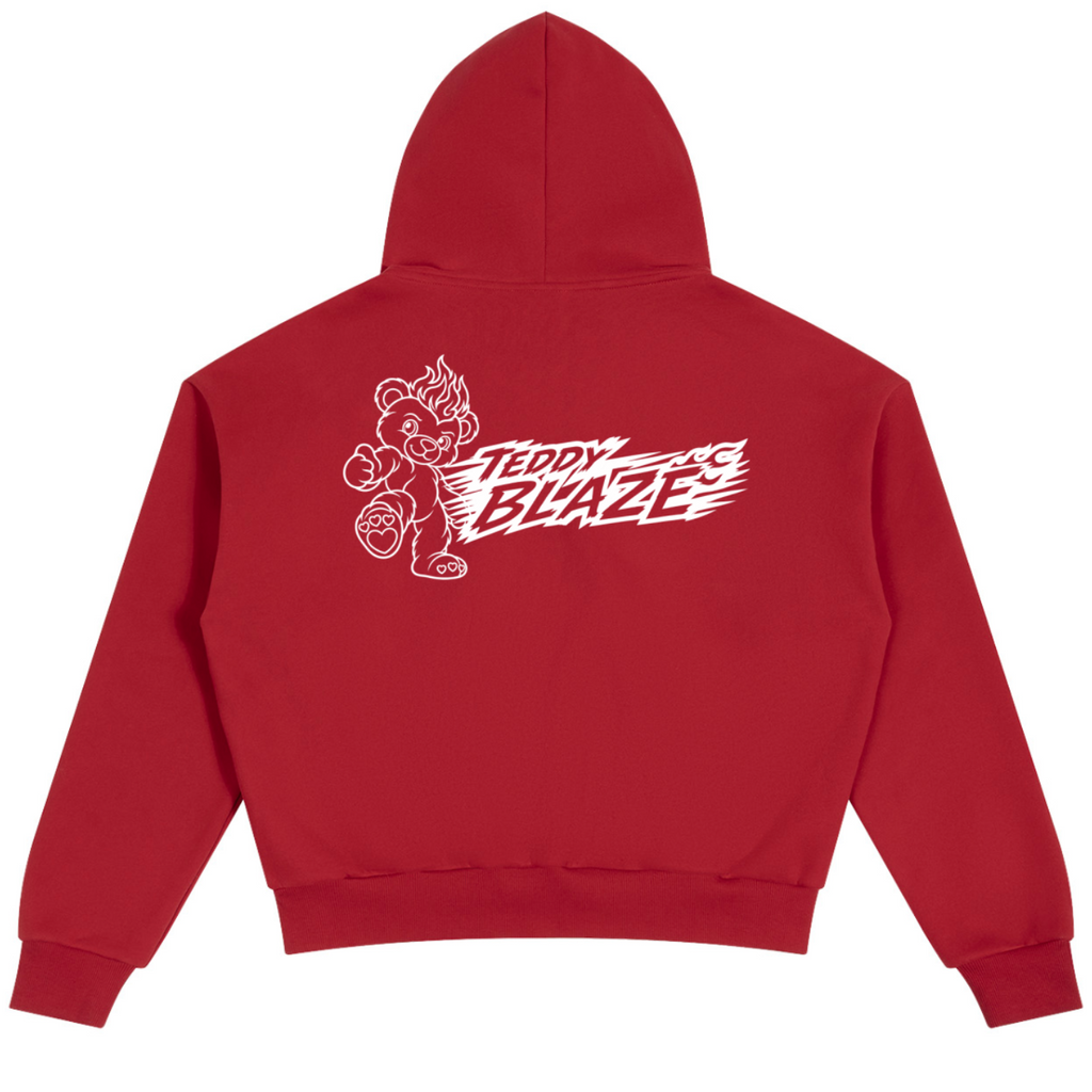A red cropped hoodie shown from the back, featuring a white graphic print of a cartoon mascot and the text 'TEDDY BLAZE' across the upper back.