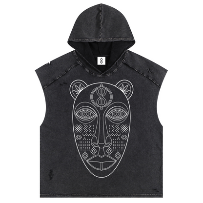 A sleeveless hooded crop top in washed black denim featuring a large white line-art graphic of an African-style mask on the front, shown against a plain white background.
