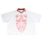A white short-sleeve polo shirt with a red and white striped V-neck collar and a large red line-art graphic of a stylized face on the front, shown against a plain white background.